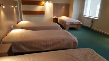 Фото номера Четырехместный номер Отель Hotel Gulbene г. Гулбене 3