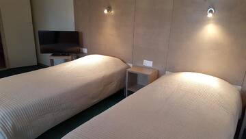 Фото номера Трехместный номер Отель Hotel Gulbene г. Гулбене 6